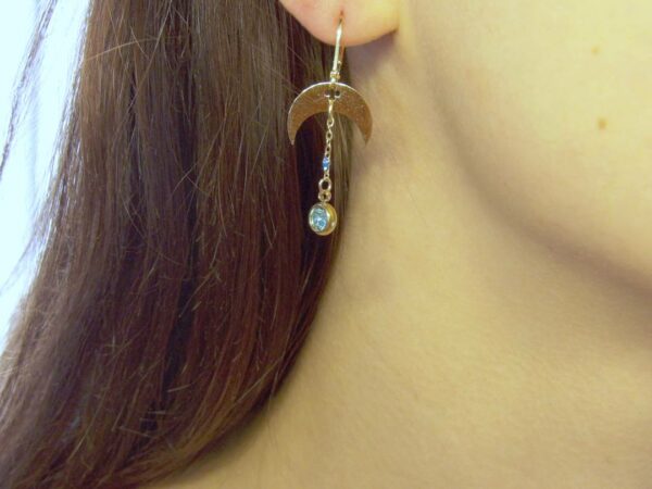 Boucles d'oreilles fantaisie de marque